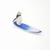 Porcelain Surfing Penguin