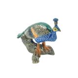 Peacock on Log